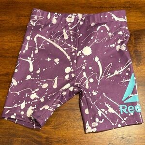 Reebok shorts  3T little girl. Purple with splash of white and aqua blue logo.